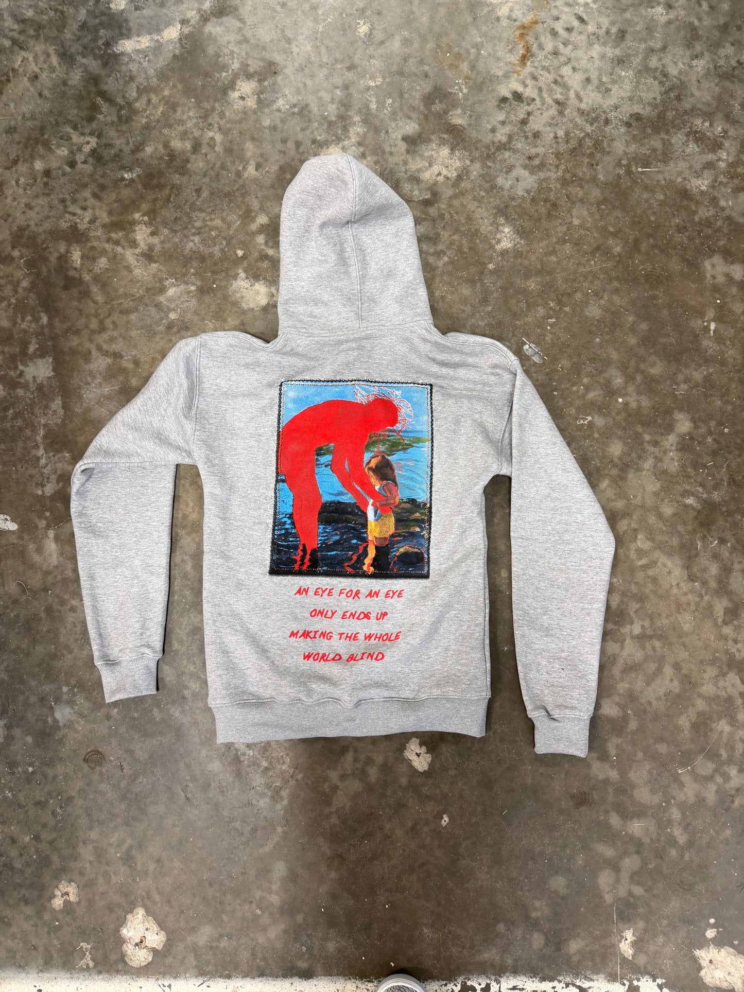 Nonahmi “Eye For An Eye” hoodie in grey