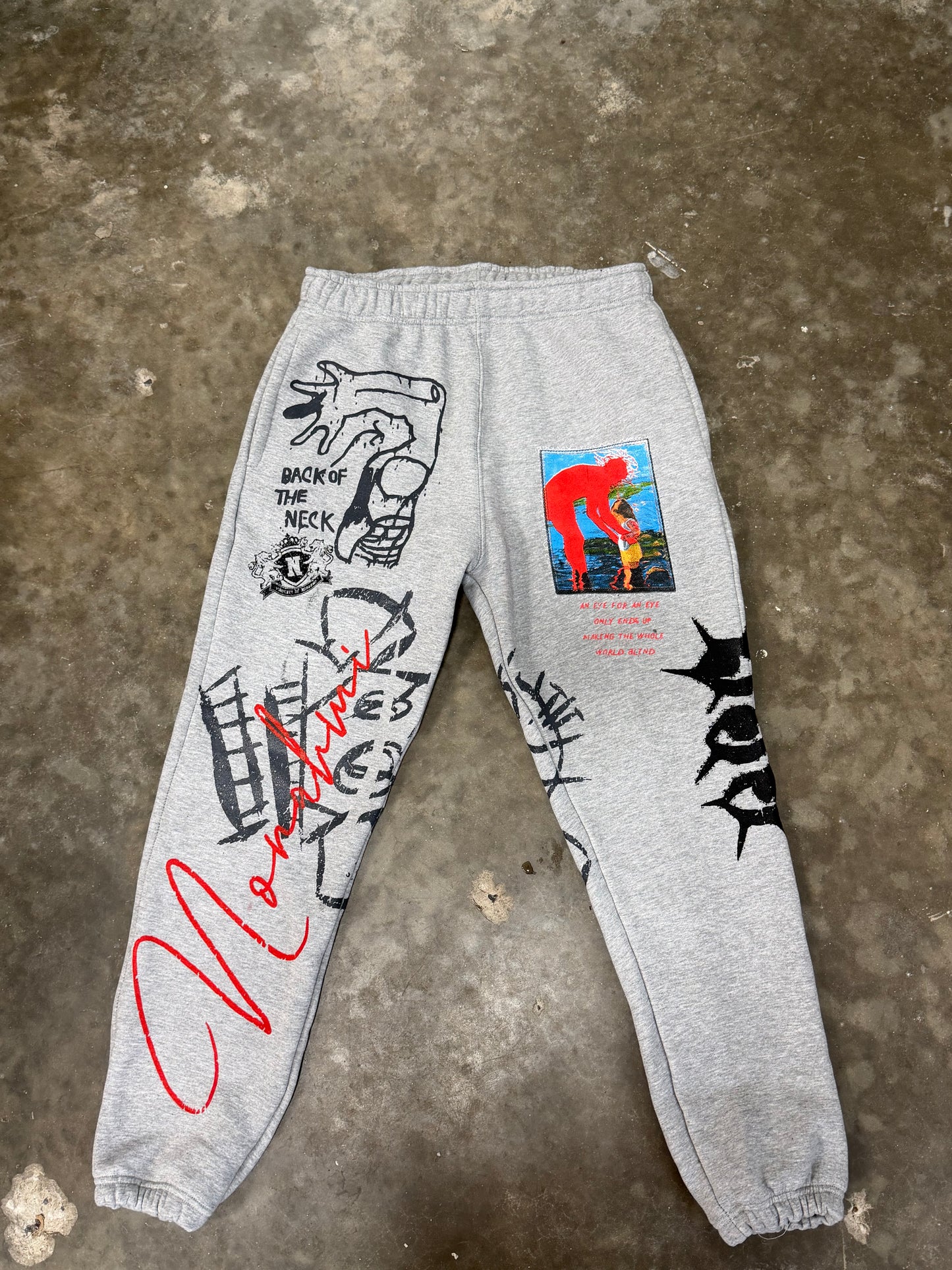 Nonahmi “Eye For An Eye” sweatpants in grey