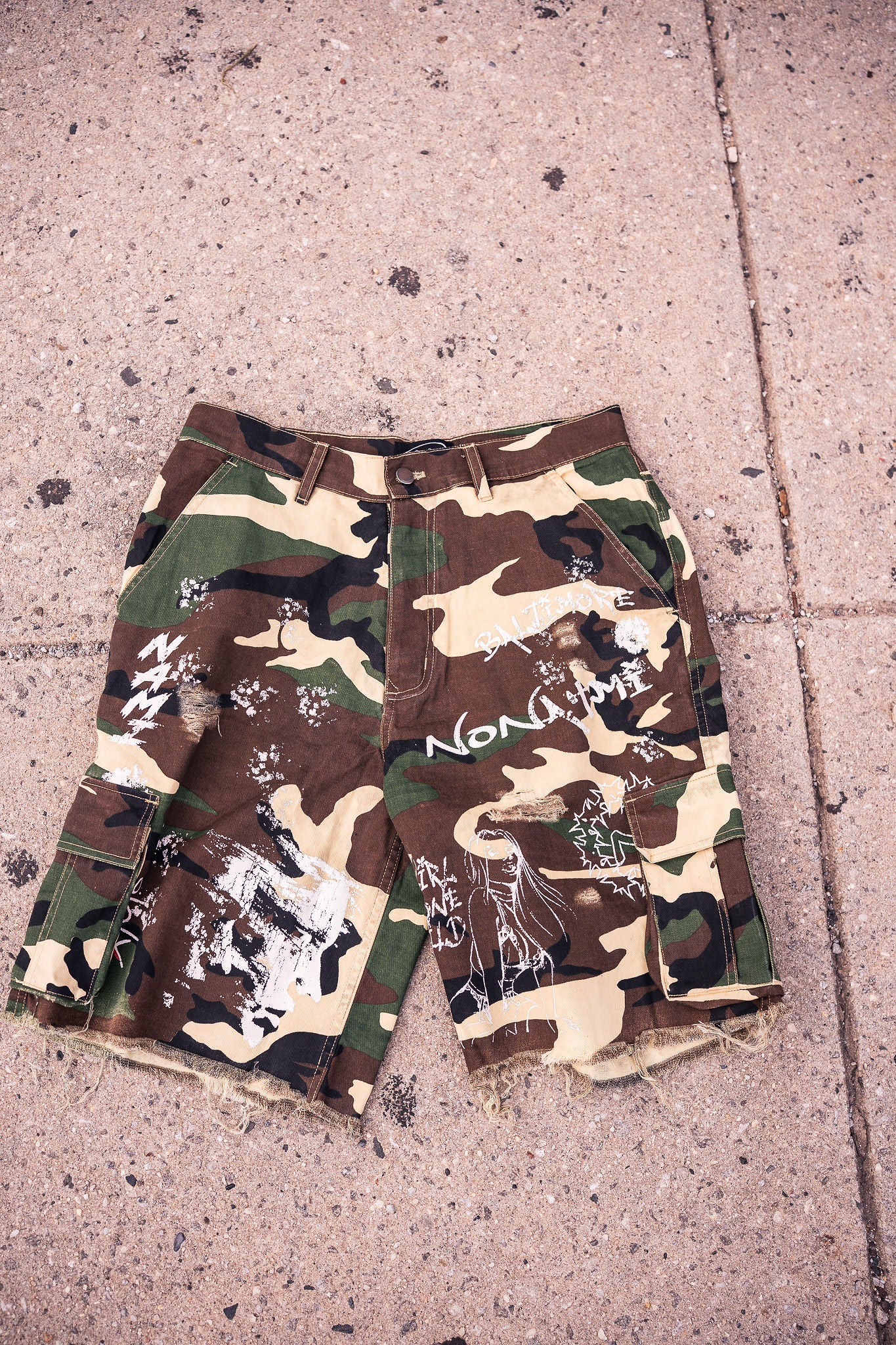 Nonahmi “Chaos” camo cargo shorts